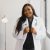 portrait-of-smiling-female-doctor-wearing-white-co-2025-03-13-16-21-24-utc.jpg